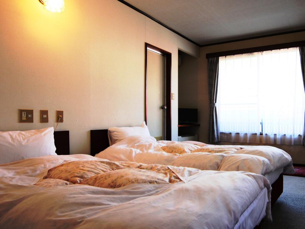 Ikemoto Hotel Nozawaonsen Bagian luar foto