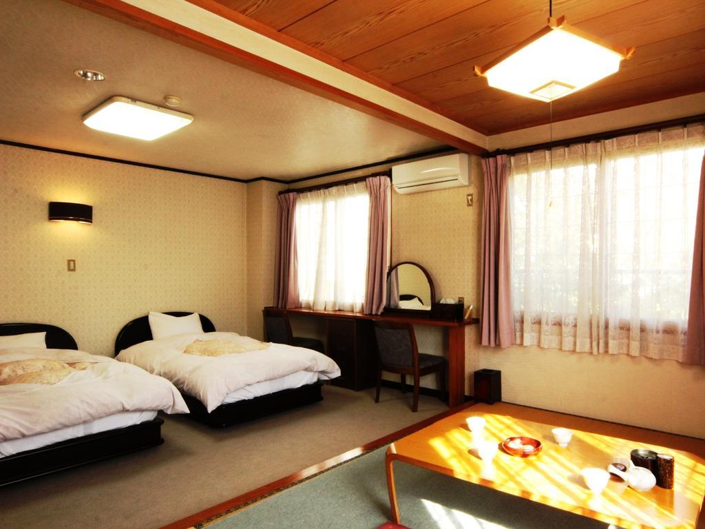 Ikemoto Hotel Nozawaonsen Bagian luar foto