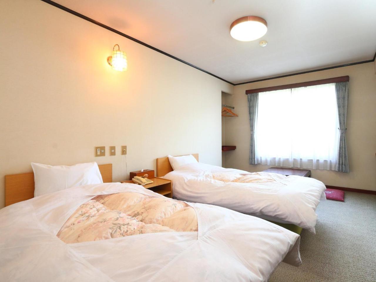 Ikemoto Hotel Nozawaonsen Bagian luar foto